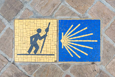 Camino de Santiago pilgrimage sign on the pavement in Chartres, France.の写真素材