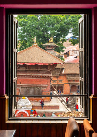 KATHMANDU, NEPAL - CIRCA APRIL 2018: Window with a view on Kathmandu Durbar Square.のeditorial素材