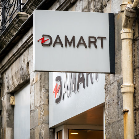 BAYONNE, FRANCE - CIRCA DECEMBER 2020: Damart sign at shop entrance in the town center.のeditorial素材