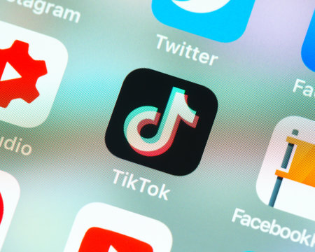 BAYONNE, FRANCE - CIRCA JANUARY 2021: TikTok app icon on Apple iPhone screen. TikTok is a video sharing social networking service owned by Chinese company ByteDance.のeditorial素材