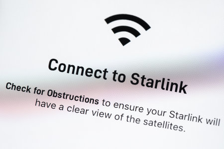 BAYONNE, FRANCE - CIRCA FEBRUARY 2021: Starlink app on Apple iPhone screen. Starlink is a satellite internet constellation being constructed by SpaceX to provide satellite internet access.のeditorial素材