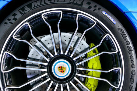 LONDON, UK - CIRCA JUNE 2014: Closeup of a Porche 918 Spyder wheel, carbon ceramic brake system and Michelin tire.のeditorial素材