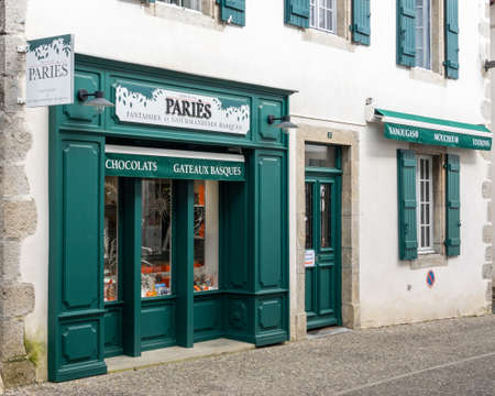 ESPELETTE, FRANCE - CIRCA FEBRUARY 2021: Paries shop facade. Paries is a chocolate, pastry, ice cream and confectionery maker from the French Basque Country.のeditorial素材