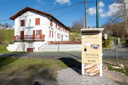 SUHESCUN, FRANCE - CIRCA DECEMBER 2020: Minhondo Bakery baguette vending machine.のeditorial素材