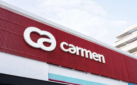 ANGLET, FRANCE - CIRCA MARCH 2021: Carmen sign and logo on building facade. Carmen is a real estate agency group from south west France.のeditorial素材