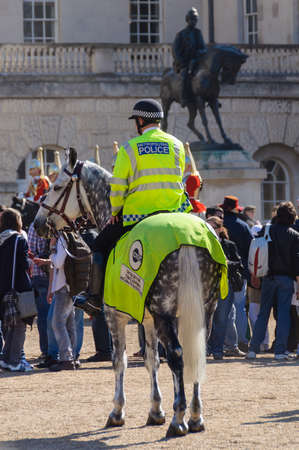 LONDON, UK - CIRCA APRIl 2011: Mounted police officer at Horse Guard Parade.のeditorial素材