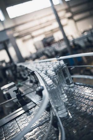 Bottling plant - Water bottling line for processing and bottling pure mineral carbonated water into bottles.の写真素材