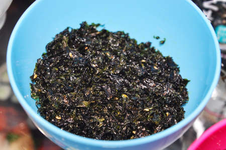 Korean dried seaweed in a blue bowlの写真素材