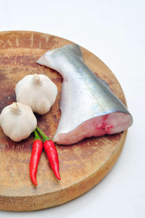 Pangasius or Vietnamese catfish in the kitchen in a white backgroundの写真素材