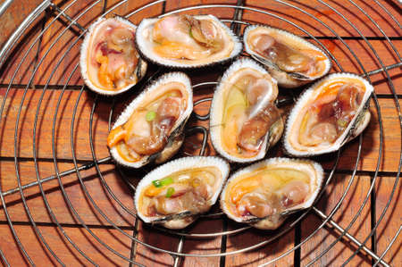 Shell steaks on the grillの写真素材