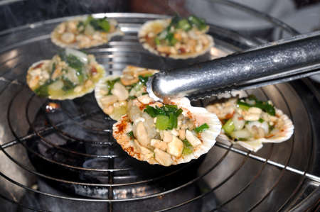 Shell steaks on the grillの写真素材
