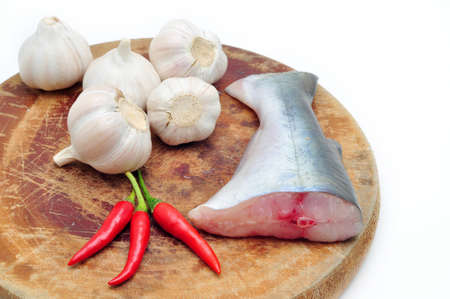 Pangasius or Vietnamese catfish in the kitchen in a white backgroundの写真素材