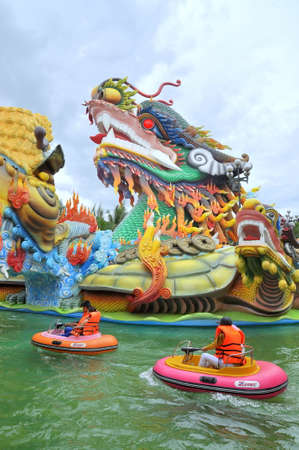HO CHI MINH CITY, VIETNAM - MARCH 31, 2012: Children and their families are playing water games in the lake of Dam Sen in Saigonのeditorial素材
