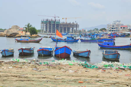 Nha Trang, Vietnam - July 11, 2015: Slum under the bridge in Nha Trang cityのeditorial素材