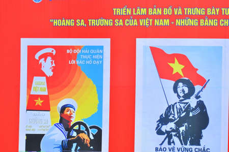 Nha Trang, Vietnam - July 11, 2015: A propaganda poster about protecting the Spratly islands in the square in Vietnamのeditorial素材