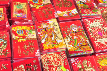 Nha Trang, Vietnam - February 7, 2016: Red lanterns, envelopes and lucky items are for sale in the lunar new year on the street of Vietnamのeditorial素材