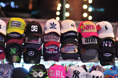 Nha Trang, Vietnam - February 6, 2016: Pretty hats are for sale in a local night market in Vietnamのeditorial素材