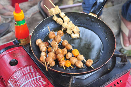 Cam Ranh, Vietnam - February 9, 2016: Street food vendors are serving people in the lunar new year in Vietnamのeditorial素材