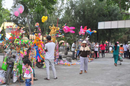 Cam Ranh, Vietnam - February 9, 2016: Hawkers are selling toys and lucky things in a pagoda on the first day of the lunar new year in Vietnamのeditorial素材