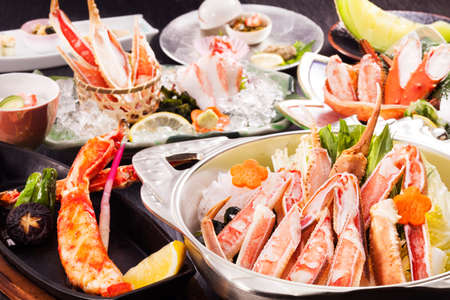 Tray food of crab and seafood on the tableの写真素材