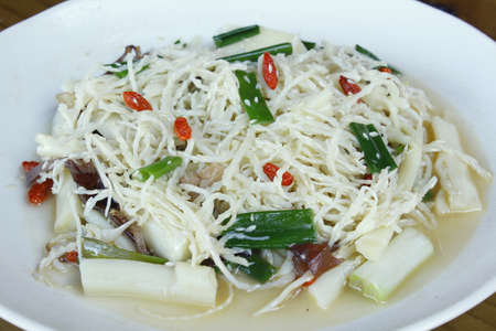 Fried bamboo shoots with lotusの写真素材