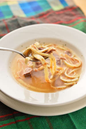 Chinese noodle on white plate in the restaurantの写真素材