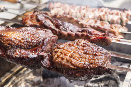 Tasty fried beef on the grill outdoorの写真素材
