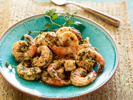 Hot spicy grilled Shrimp Scampi on plate in restaurantの写真素材