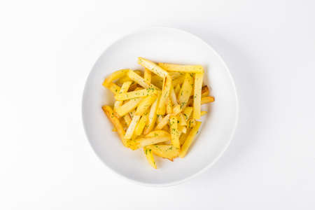 Fried crispy potatoes on white plate background