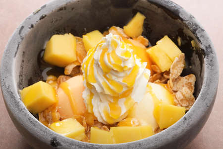 Mango Stone parfait Mango of acidity is perfect to combined after meals and iceの写真素材