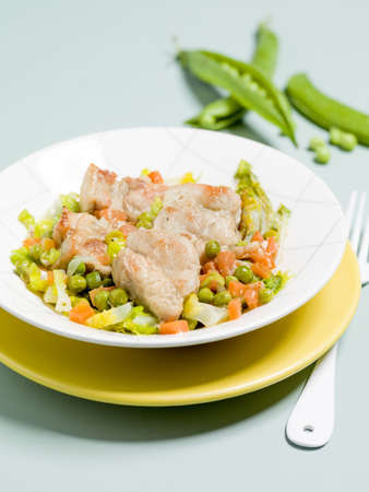 Spezzatino primavera or spring Navarino with green beans on white plate in restaurantの写真素材