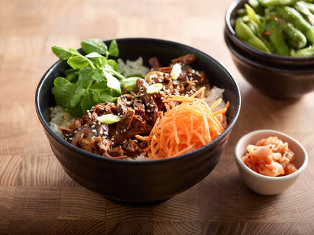 Lifestyle Beef Donburi with rice, kimchi and boiled soyal beanの写真素材