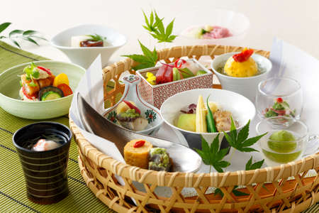 Basket of japanese food with sushi and vegetables soupの写真素材