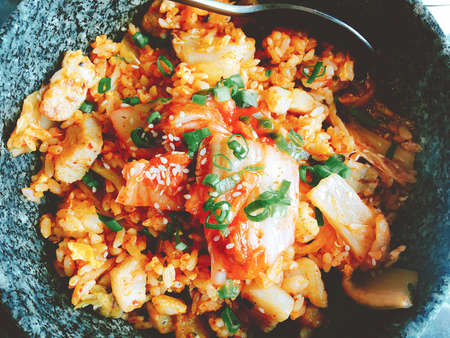 Hot bowl of Kimchi rice in Korean styleの写真素材