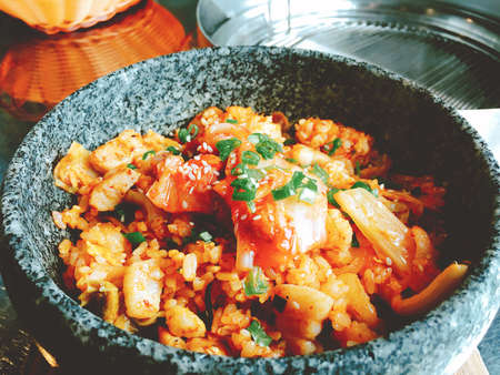 Hot bowl of Kimchi rice in Korean styleの写真素材