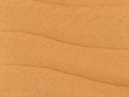Golden sands with texture on the beachの写真素材