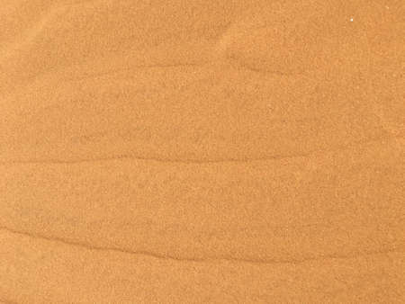 Golden sands with texture on the beachの写真素材