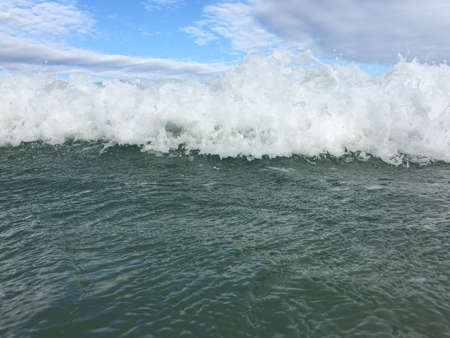 Sea waves reaching lapping to shore
