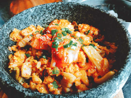 Hot bowl of Kimchi rice in Korean styleの写真素材