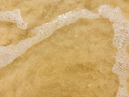 Sea waves reaching lapping to shore