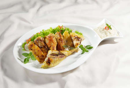 Fried chicken with lectuceの写真素材
