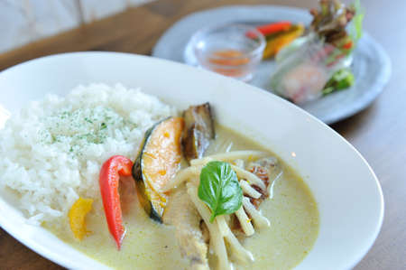 Special curry rice with eggplant and basilの写真素材