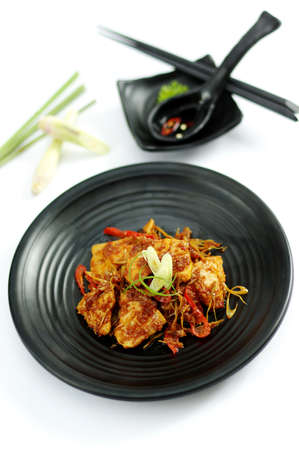 Sauteed beef with spices on black platterの写真素材