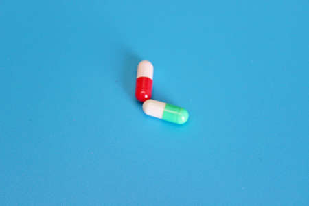Pharmacology pills on blue backgroundの写真素材