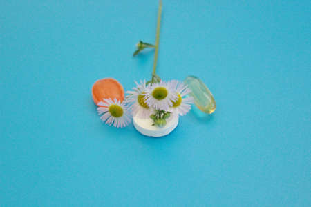 Pharmacology pills on blue background