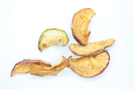 Dried apples are located on a white backgroundの写真素材