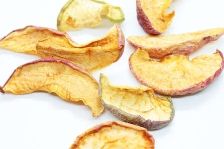 Dry ripe apples located on a white background