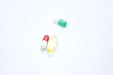 tablets, capsules, vitamins, located on a white background