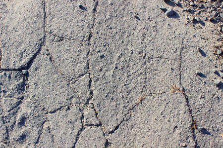 Cracked grey asphalt city heat summer heat