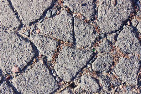 Cracked grey asphalt city heat summer heat